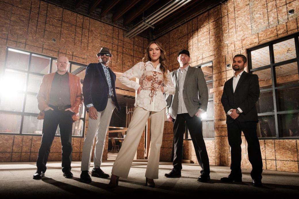 Paige Anne with the group Almost Famous.